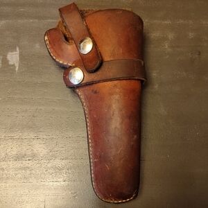 Brown Leather Bag with Smooth Finish and Secure Closure